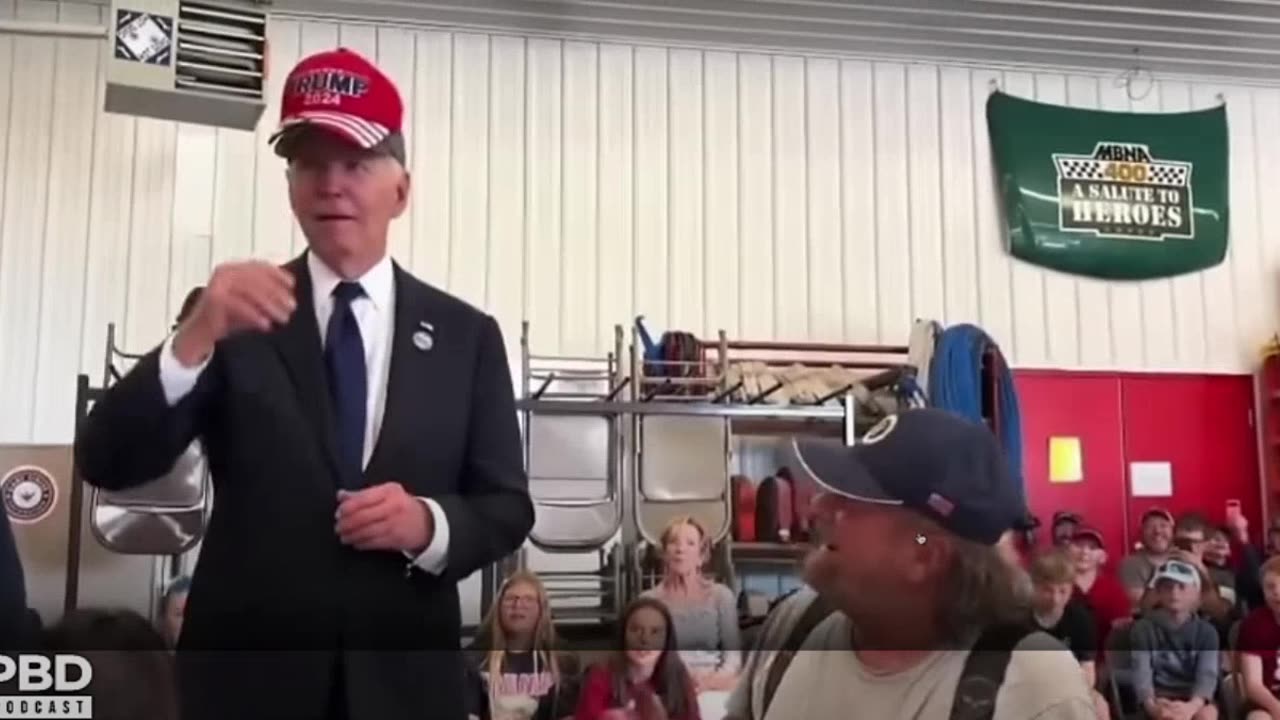 BIDEN Puts on a TRUMP Hat