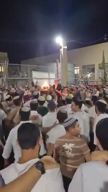 Israelis are seen celebrating and dancing as the IDF continues to bomb Rafah.