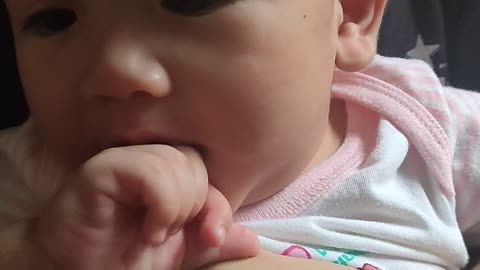 This baby so cute. Trying to eat a finger??!?! Lol