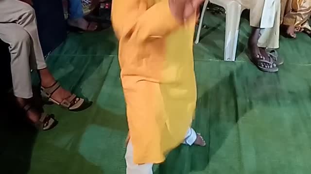 An indian boy dance in haldi ceremony