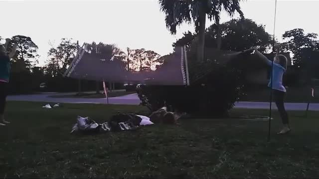 White hammock kid flies off on back