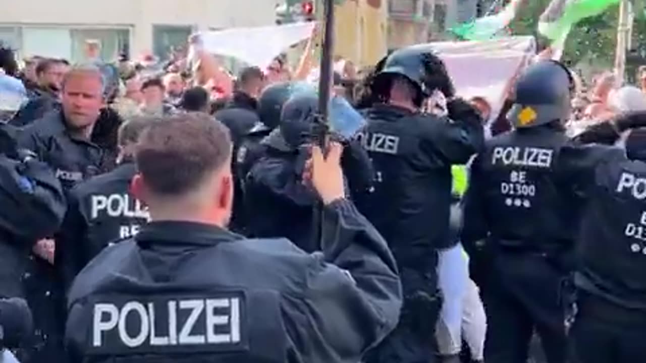 This on Rheinstrasse street in SW Berlin where pro-Palestinians intimidate the police.