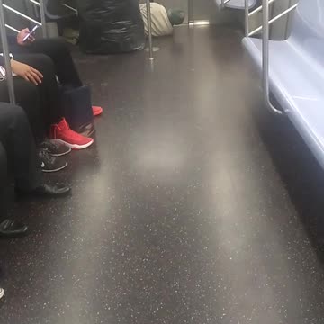 Sleeping homeless person subway green