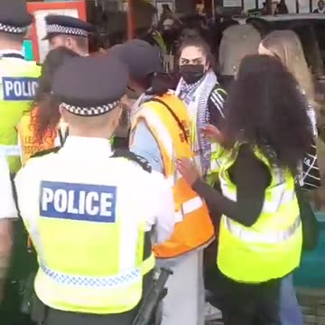 pro-Palestinian protester starts spitting at Jews in Kentish Town and is arrested.