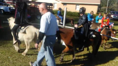 My nephew riding horse.