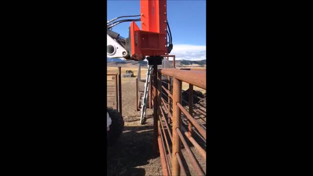 Rancher Installing Corrals