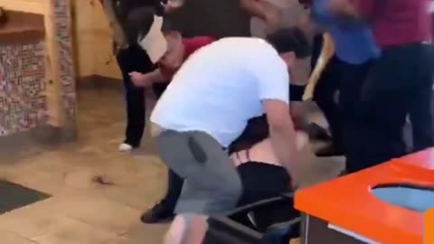 "Pizza Shop Showdown: Customer Clash Caught on Camera!"