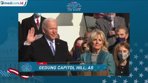 Joe biden is taking the oath