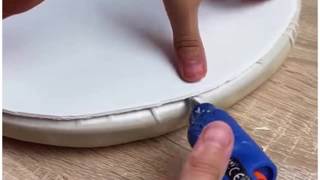 Turning a plastic paint bucket into a luxurious round stool