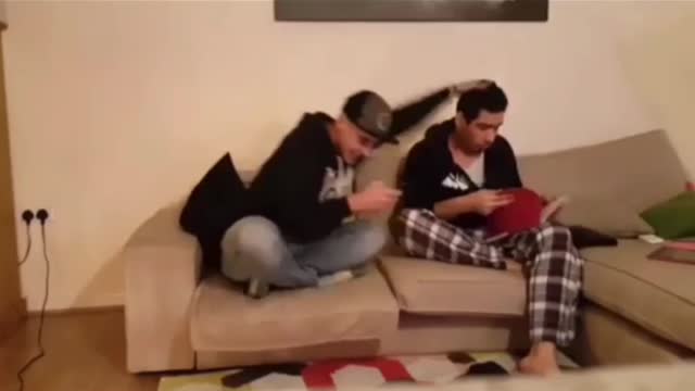 Actually, the sitting people are like this।।The man is watching the video and beating
