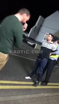 Irish Guy P*ssing On A Cop Car.
