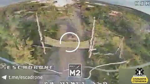 Ukrainian Drone Flies Strait Through Russian Anti-Drone Netting and Smashes Russian Tank