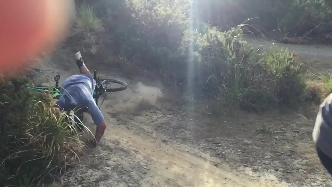 Guys bike 2nd faceplant grass patch