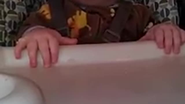 Funny baby wants his food