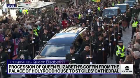 King Charles III leads the processional for the queen into St. Giles’ Cathedral