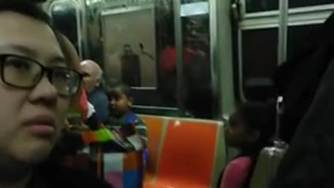 Woman red pink tank top arguing with passenger on train