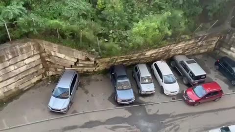 A retaining wall collapsed onto seven cars in the Russian city of Vladivostok