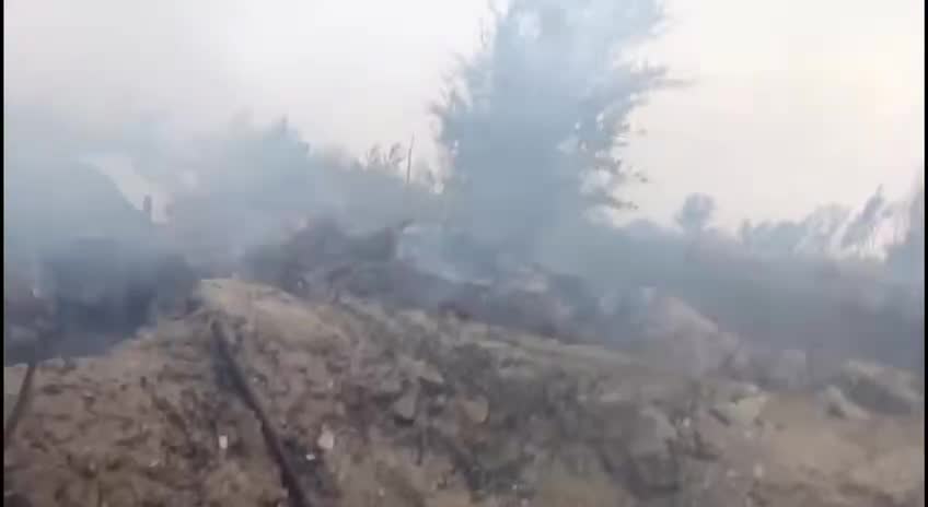 Ukrainian soldiers after Russian Armed Forces shelling