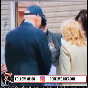 Biden touches a little girl