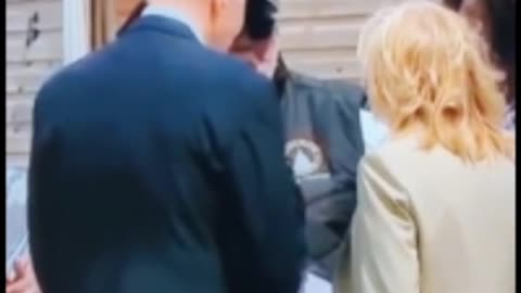 Biden touches a little girl