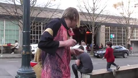 Look at this guy smoking crack in front of children in Portland, Oregon. 🤬