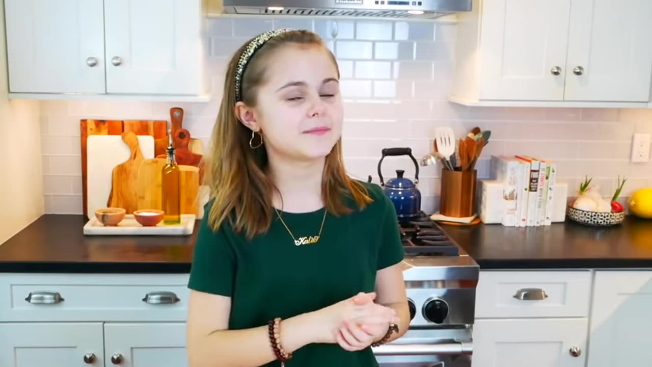 Cute girl cooking for peanut butter smothy