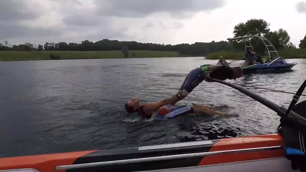 One Legged Man Enjoys Water Sports With His Friend