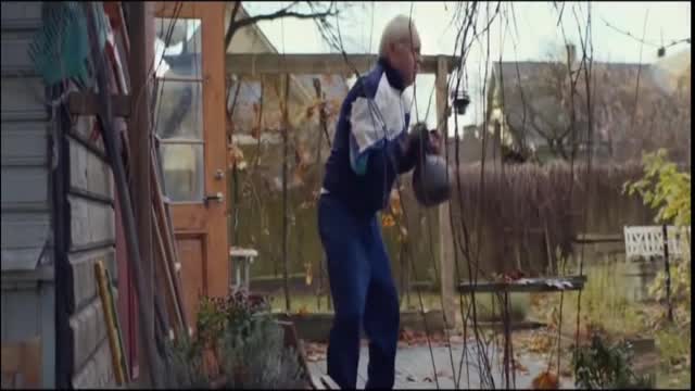 Grandfather training with kettle-bell