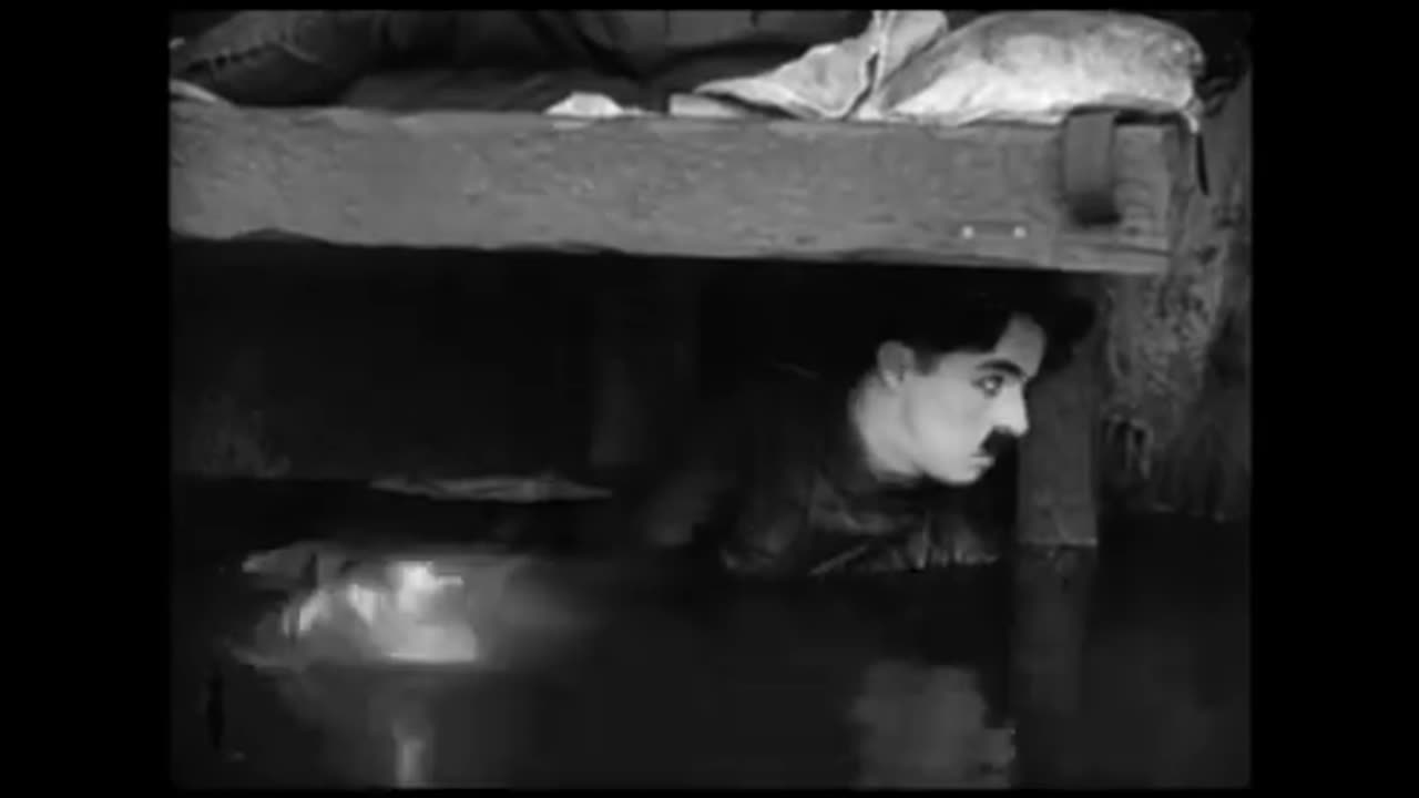 Charlie Chaplin - L comme Lit