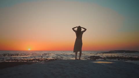 Beautiful Girl Enjoying Beach Sunset