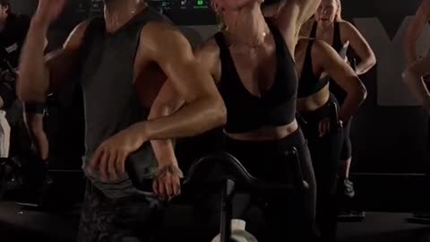Guys and girls working out together