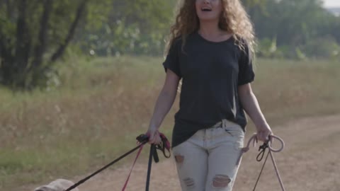 Girl with her nice dogs