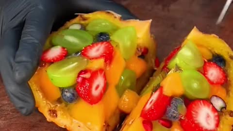 Fruit stuffed Pineapple preparation