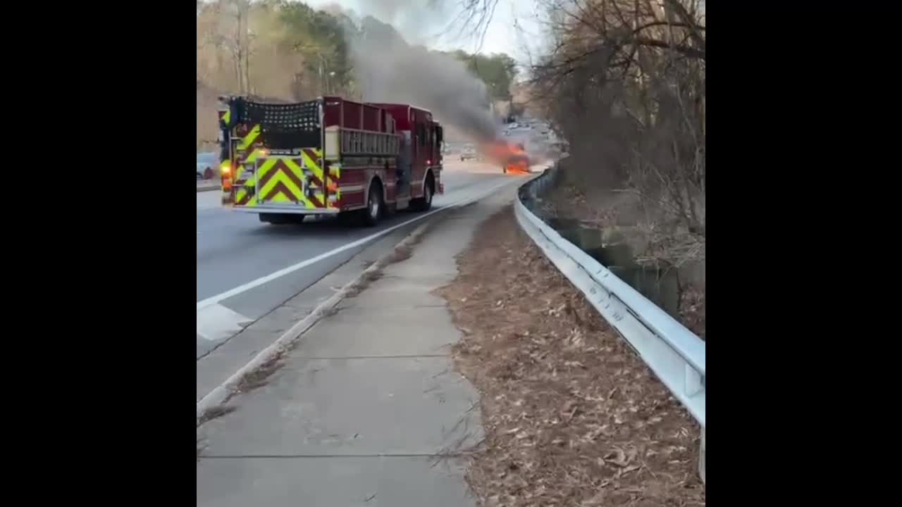 Car Driving on Rim Catches Fire