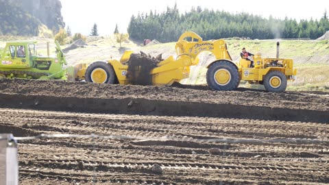 Classic Bulldozers and Motor Scrapers Working