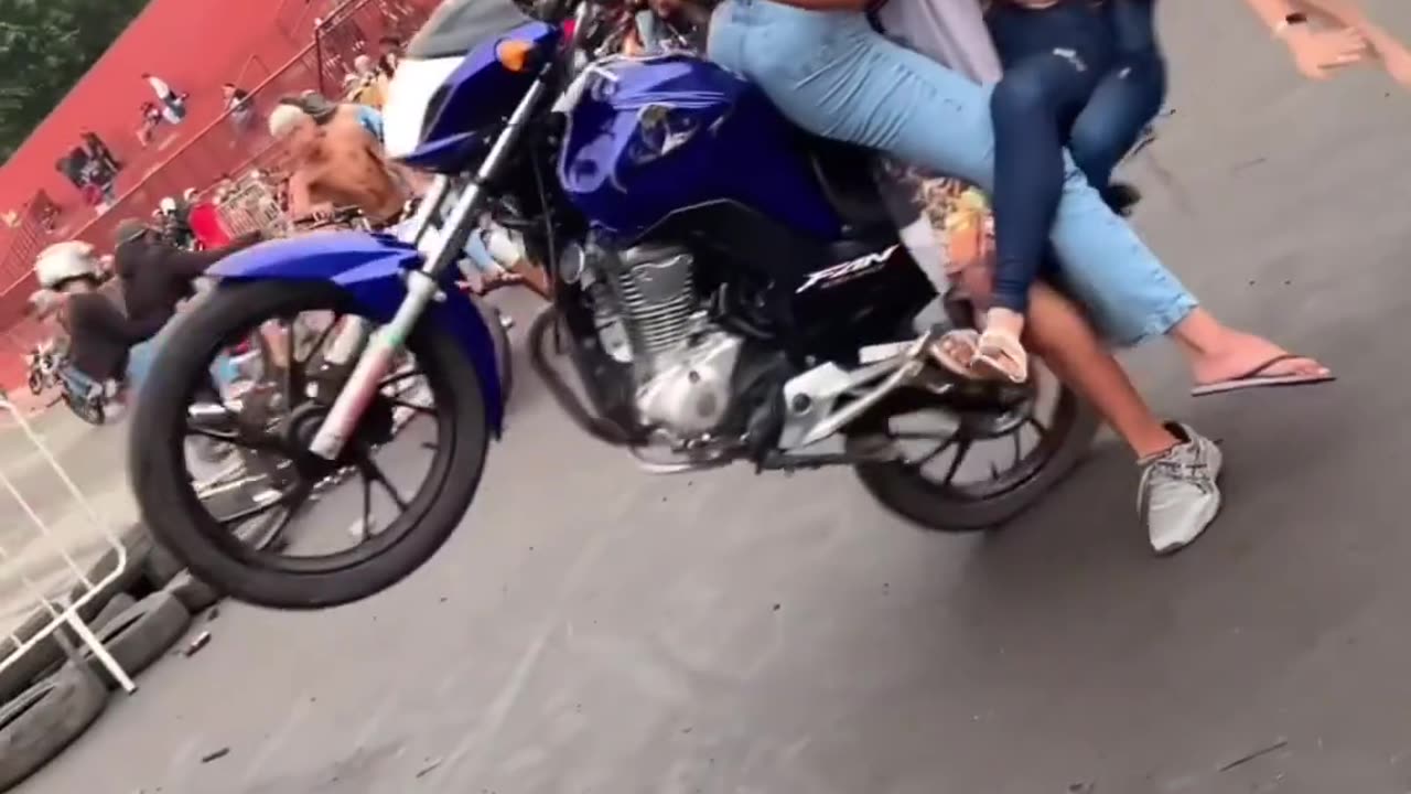 Funny wheelie with girl