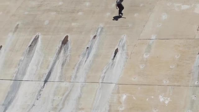 Guy Skates Down a Massive Drain Pipe Into Water 🔥