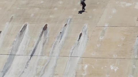 Guy Skates Down a Massive Drain Pipe Into Water 🔥