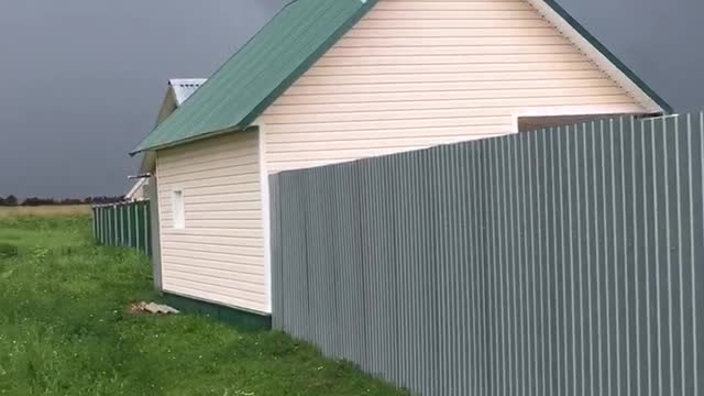 The beginning of a thunderstorm in the village