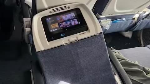 Boeing seat launches mid flight trapping passenger in the over head bins...