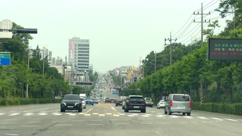 Cars driving on a road in Incheon, South Korea, May 18, 2023