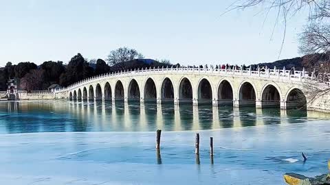 Snowy view by the bridge