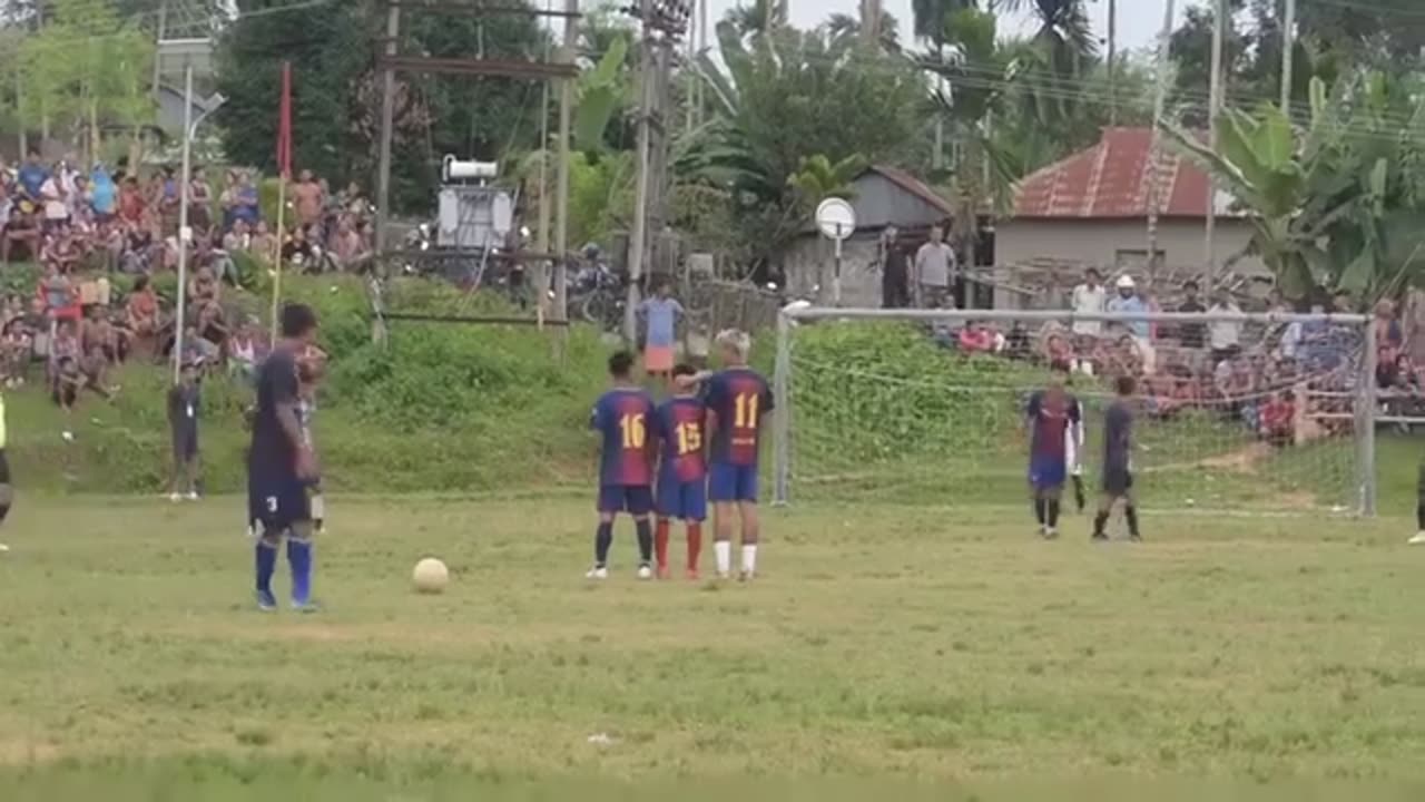 Free kick a villager boy football free kicked viral