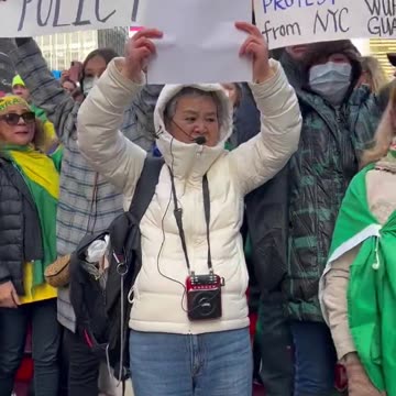 Anti-communist protesters from around the world stand together in NYC