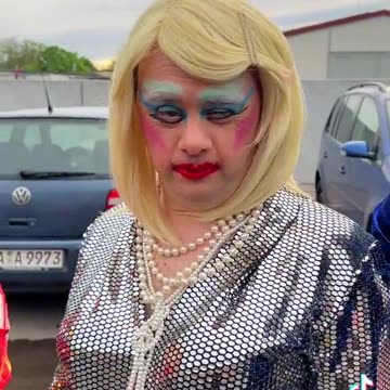 A group of vulnerable men with Down Syndrome being paraded