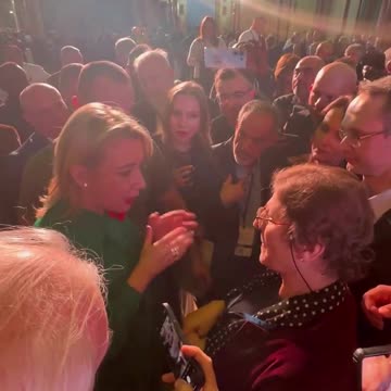 Maria Zhakarova speaking with Amal, a Palestinian Delegate