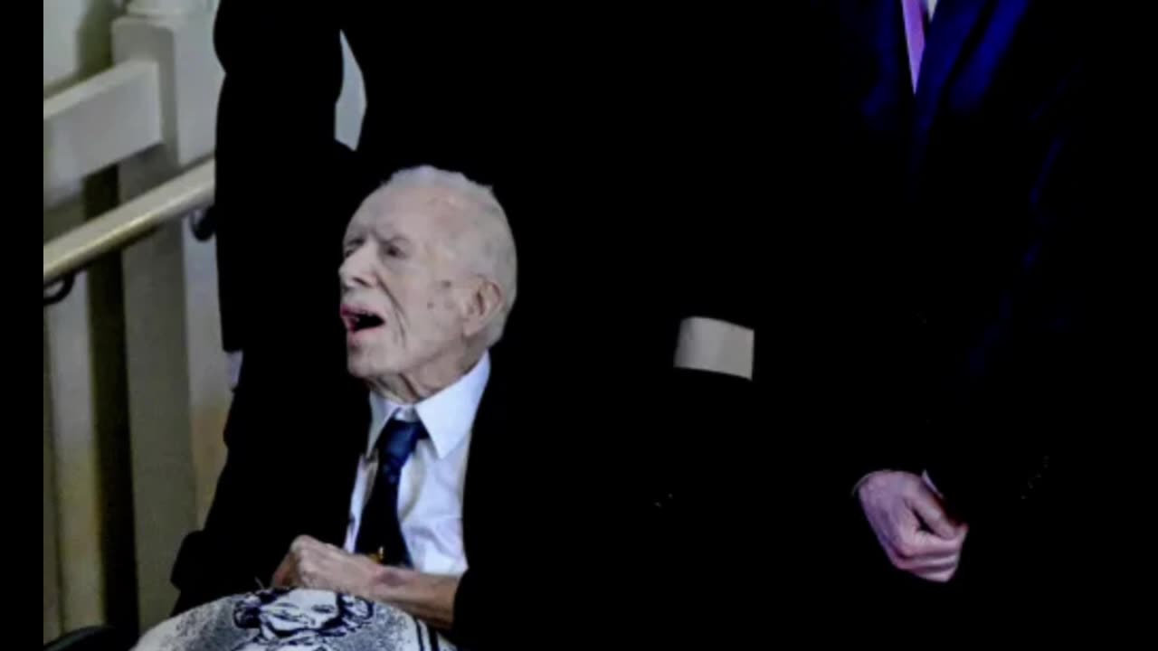 CAN SOMEONE GET JIMMY CARTER SOME MORE OF THAT RED STUFF PLEASE! HE LOOKS THIRST