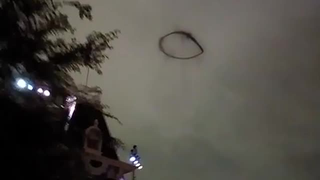 Scary Black Ring UFO Above Disneyland