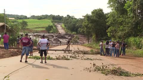 Rescuers search for Brazil dam survivors