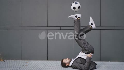 Soccer freestyle player making tricks with the ball